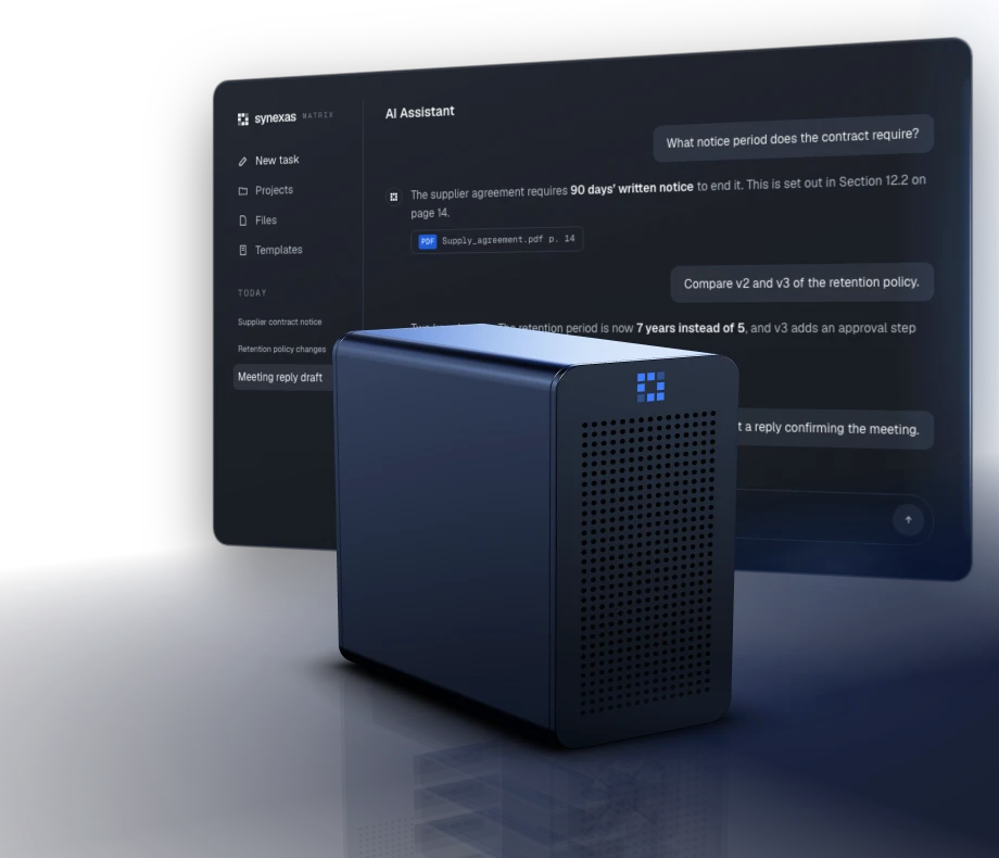 The Matrix system, a graphite tower, in front of the AI assistant on its screen